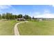 Aerial view of a charming home on a sprawling lot with mature trees at 10522 Bayou Gulch Rd, Parker, CO 80134