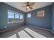 Comfortable bedroom with large window for plenty of natural light at 190 Roslyn St # 802, Denver, CO 80230