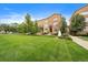 Attractive townhome community with manicured lawns and a central green space at 190 Roslyn St # 802, Denver, CO 80230