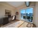 Cozy home office with desk, chair, and sliding glass doors to balcony at 190 Roslyn St # 802, Denver, CO 80230