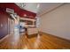 Spacious kitchen featuring stainless steel appliances, island, and hardwood flooring at 190 Roslyn St # 802, Denver, CO 80230