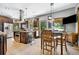 Bright kitchen featuring stainless steel appliances, a center island, and a breakfast nook at 4380 Sandstone Dr, Monument, CO 80132