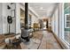 Relaxing sun room featuring a wood-burning stove, tiled floor and natural light at 4380 Sandstone Dr, Monument, CO 80132