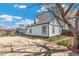 House exterior showing well-maintained yard and patio at 4401 Quieto Ct, Denver, CO 80211