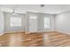 Spacious living room with natural light and hardwood floors, creating a warm atmosphere at 4401 Quieto Ct, Denver, CO 80211