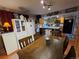 Eat-in kitchen featuring a large dining table and an island at 604 S Xenon Ct, Lakewood, CO 80228