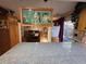 Spacious kitchen with granite countertops, wood cabinets and a decorative glass lighting fixture at 604 S Xenon Ct, Lakewood, CO 80228