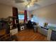 Study with hardwood floors, a desk, and a cat tree, perfect for working or studying at home at 604 S Xenon Ct, Lakewood, CO 80228