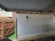 Covered parking area displaying unit number and wooden gate, offering convenience and security at 604 S Xenon Ct, Lakewood, CO 80228