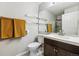 Bathroom features a vanity sink, toilet, and towel rack at 8707 E Florida Ave # 814, Denver, CO 80247