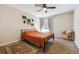 Bright bedroom features a ceiling fan, carpeted floor, neutral walls, and a cozy area rug at 8707 E Florida Ave # 814, Denver, CO 80247