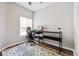 Cozy home office area with natural light, sleek desk, and stylish rug, ideal for a productive workspace at 8707 E Florida Ave # 814, Denver, CO 80247