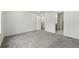 Bedroom with neutral paint and gray carpet at 17115 W 91St Ln, Arvada, CO 80007