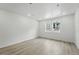 A bright, spacious bedroom with hardwood floors and ample natural light at 17115 W 91St Ln, Arvada, CO 80007