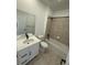 Bathroom with a shower and tub at 3443 N Denali St, Aurora, CO 80019