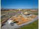 Community playground with a carousel, play structures, and seating at 3443 N Denali St, Aurora, CO 80019