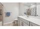 Bathroom featuring a white vanity, a large mirror, a shower, and neutral colors at 17409 Springfield Dr, Parker, CO 80134