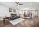 Spacious living room with open concept design, wood floors, and comfortable seating at 17409 Springfield Dr, Parker, CO 80134