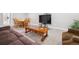 Basement area featuring living room, table with chairs and TV at 17409 Springfield Dr, Parker, CO 80134