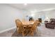 Cozy living room featuring a round dining table and comfortable seating area for relaxing and entertaining at 17409 Springfield Dr, Parker, CO 80134