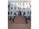Apartment building with a symmetrical design and central staircase at 215 E 11Th Ave # A5, Denver, CO 80203