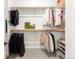 Well-organized walk-in closet with ample shelving and hanging space for storage at 1925 W 165Th Way, Broomfield, CO 80023