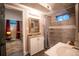 Basement bathroom includes a shower and vanity at 3125 Xenon St, Wheat Ridge, CO 80215