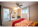 Bedroom showing carpeting and neutral paint with a small decorative fireplace feature at 3125 Xenon St, Wheat Ridge, CO 80215