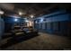 Home theater with tiered seating, projector, and cozy ambiance perfect for movie nights at 3125 Xenon St, Wheat Ridge, CO 80215