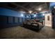 Stunning home theater with plush seating and modern projector for an immersive entertainment experience at 3125 Xenon St, Wheat Ridge, CO 80215