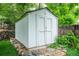 Storage shed with stone landscaping is tucked away in the backyard of this home at 3125 Xenon St, Wheat Ridge, CO 80215