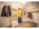 Spacious walk-in closet with built-in shelving and ample hanging space at 3125 Xenon St, Wheat Ridge, CO 80215
