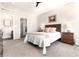 Guest bedroom with ensuite bathroom and lots of light at 521 Garden Sage Ct, Castle Rock, CO 80104