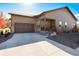 House exterior with attached garage and driveway at 521 Garden Sage Ct, Castle Rock, CO 80104