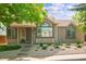 Charming single-story home with stone landscaping and a well-maintained front yard at 98 N Quicksilver Ave, Castle Rock, CO 80104