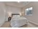 Serene bedroom with a comfortable bed, soft lighting, and a window for natural light at 2153 Abigail Ln, Castle Rock, CO 80104