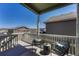 Relaxing covered deck with patio furniture, perfect for outdoor entertaining at 2153 Abigail Ln, Castle Rock, CO 80104