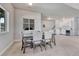 Cozy dining area adjacent to a modern kitchen, ideal for Gathering meals and gatherings at 2153 Abigail Ln, Castle Rock, CO 80104