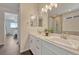 Elegant bathroom with dual sinks, modern fixtures, and ample counter space creating a luxurious experience at 2153 Abigail Ln, Castle Rock, CO 80104