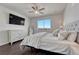 Serene main bedroom with a plush bed, natural light, and modern furnishings creating a relaxing retreat at 2153 Abigail Ln, Castle Rock, CO 80104