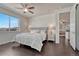 Comfortable main bedroom featuring a plush bed, ample natural light, and stylish decor for a peaceful haven at 2153 Abigail Ln, Castle Rock, CO 80104
