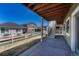 Backyard patio featuring an outdoor area and stairs to the above deck at 2153 Abigail Ln, Castle Rock, CO 80104