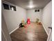 Finished basement playroom with toys and a slide at 187 Yates St, Denver, CO 80219