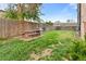 Spacious backyard with picnic table and grill, perfect for outdoor entertaining at 865 S Quebec St # 101B, Denver, CO 80247
