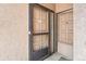 Close-up of unit entrance featuring updated doors and visible unit numbers at 865 S Quebec St # 101B, Denver, CO 80247