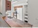 Bright kitchen with wood cabinets, stainless appliances, and pantry storage space at 865 S Quebec St # 101B, Denver, CO 80247