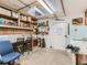 A utilitarian basement featuring a sturdy workbench and built-in storage at 3550 E 160Th Ave, Thornton, CO 80602