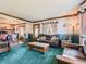 Cozy living room with comfortable seating, natural light, and inviting decor at 3550 E 160Th Ave, Thornton, CO 80602
