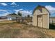 Outbuilding with ample storage space, complemented by an adjacent fenced in area at 3550 E 160Th Ave, Thornton, CO 80602