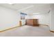 Finished basement with a bar area and carpeted floors at 10890 Depew Pl, Broomfield, CO 80020